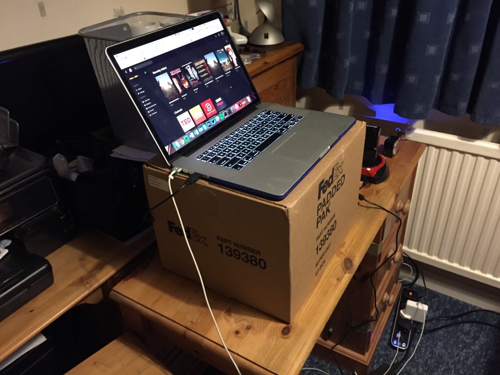 standing desk made from cardboard box